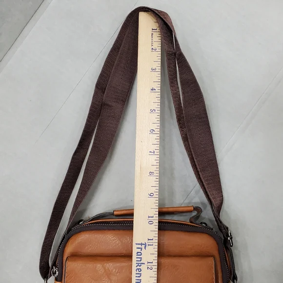 Weixier travel bag men's brown leather 9×10×2 inches adjustable strap NEW